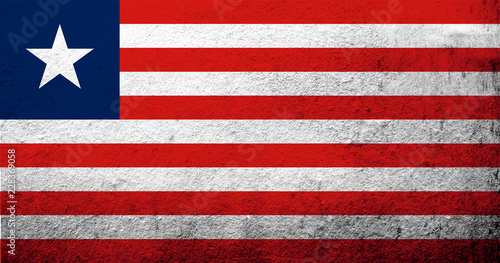 The Republic of Liberia National flag. Grunge background photo