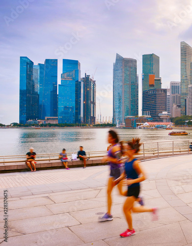 Canvas Print People running at promenade Singapore