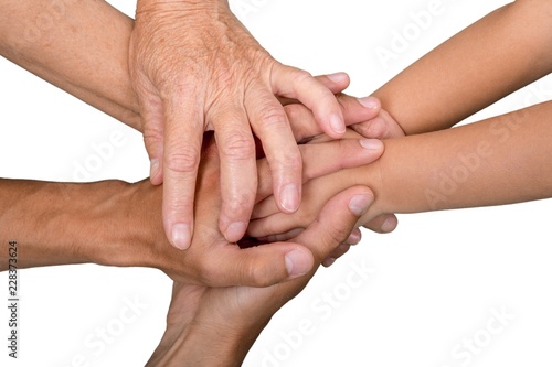 Young Woman, Child and Senior Touching and Holding Hands