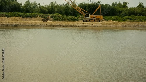 River and dragline excavator. Panoramic photo