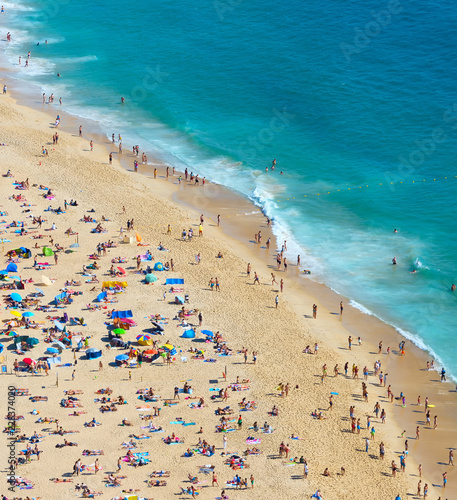 Crowded ocean beach. Aerial view © joyt