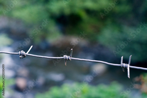 Barbed wire with blurred background