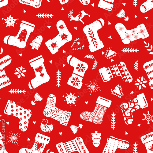 Red simple Christmas stockings for holiday celebrations Scandinavian Nordic style. Christmas, new year decor. Seamless pattern with sock and simple decoration hand drawn