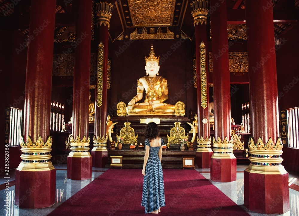 Woman in wat rajamontean buddhist temple thailand