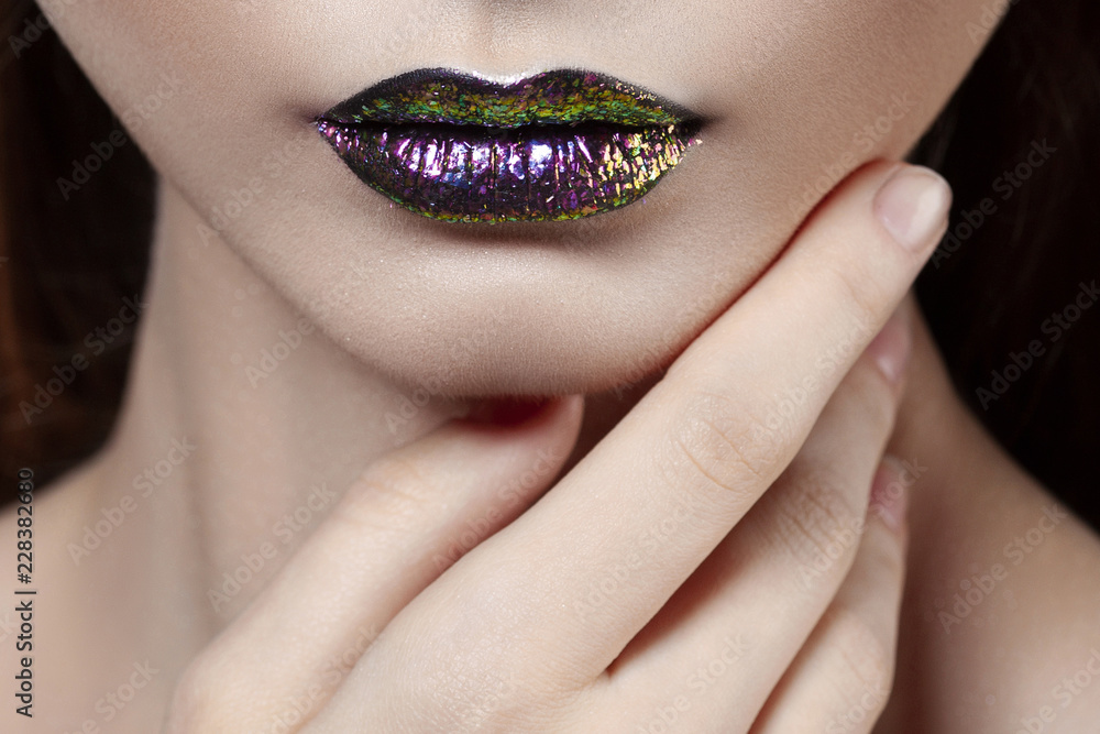 Naklejka premium Young beautiful girl with purple make-up