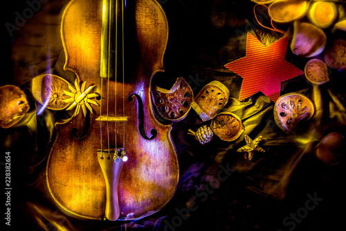 composition with an old violin in dark colors