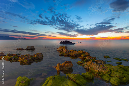 Sunset long exposure on the Alanya coast - Long exposure image of Dramatic sky and seascape with rock