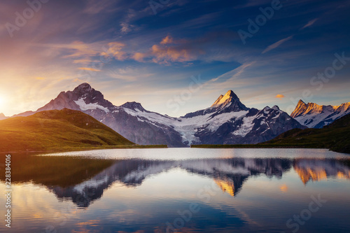 Panoramic view of the Mt. Schreckhorn and Wetterhorn. Location place Bachalpsee in Swiss alps, Grindelwald valley