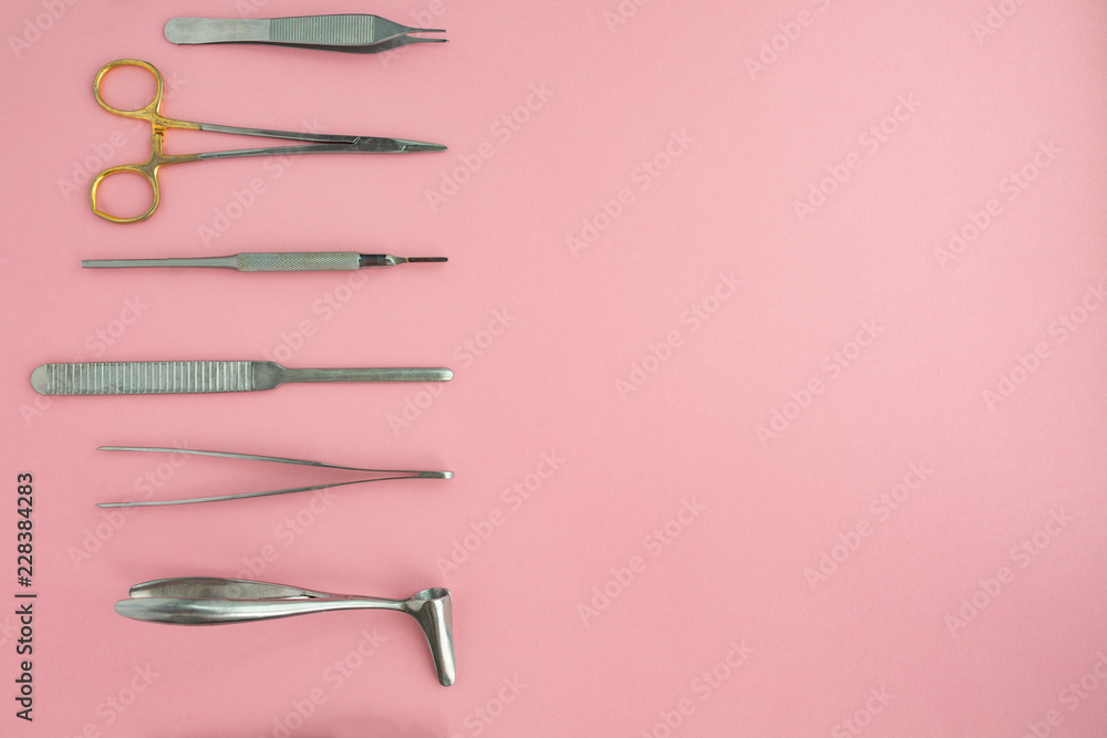 Flat lay of medical instruments on rose background. Mock up health care medical background. Flat lay of medical instruments on rose background. Mock up health care medical background.
