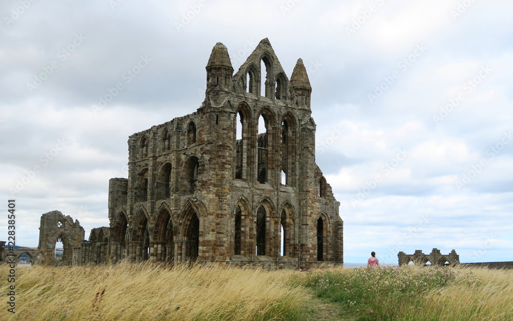 Whitby Abbey - ruins of gothic church above sea shore in England in Great Britain