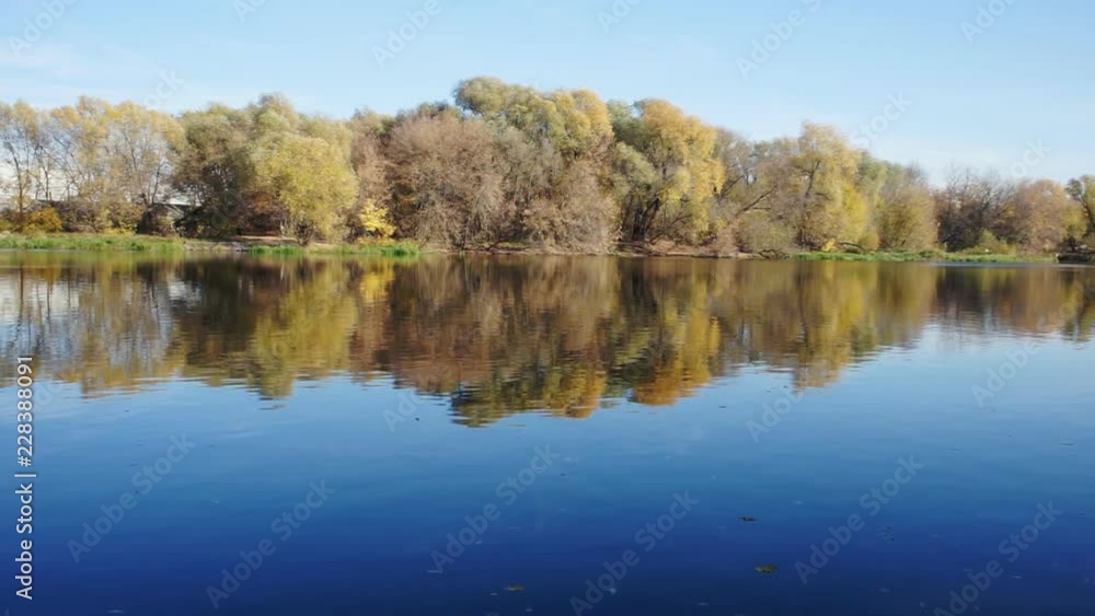 Autumn forest and bridge across the river Autumn forest and bridge across the river