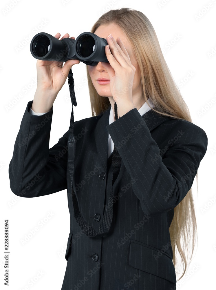 Young Businesswoman Looking Through Binoculars - Isolated Young Businesswoman Looking Through Binoculars - Isolated
