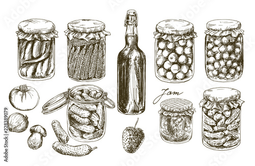 Jars with pickled vegetables and fruits.