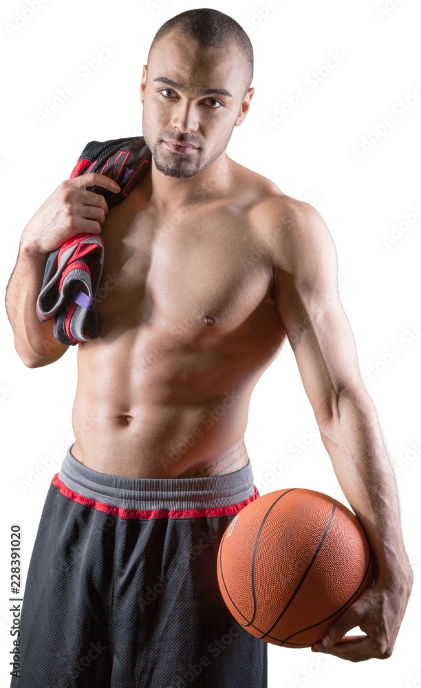Young handsome sporty man with basketball ball isolated on white
