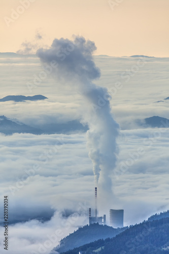 Thermal power plant smoke in foggy landscape, Sostanj, Slovenia