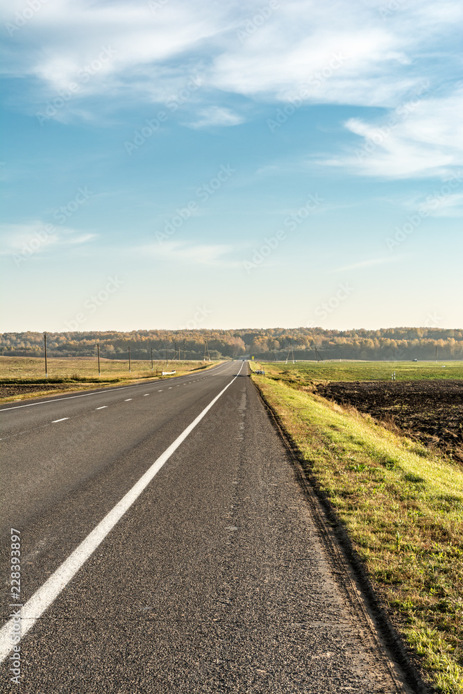modern asphalt road with road marking elements modern asphalt road with road marking elements