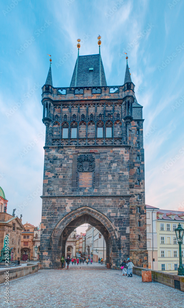 Fototapeta premium View of Charles Bridge and Lesser Bridge Tower in Prague, Czech Republic