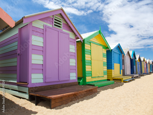 Colorful painted beach huts in Australia © PlumTree Studio