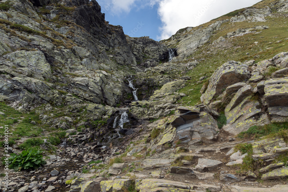 Waterfall in Rila Mountain near The Seven Rila Lakes, Bulgaria Waterfall in Rila Mountain near The Seven Rila Lakes, Bulgaria