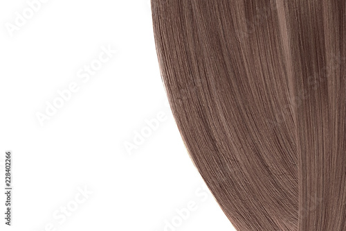 Brown (chocolate) hair, isolated on white background. Flat lay and copy space