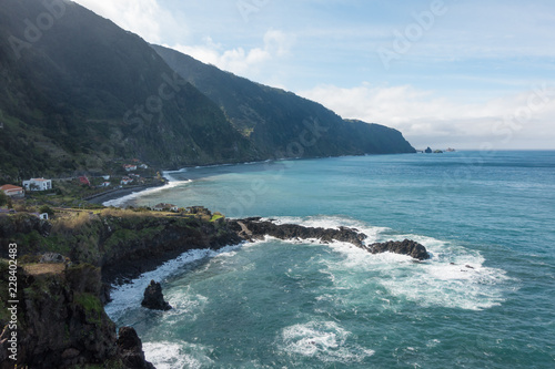 Beautiful black rock beach in Seixal, Madeira with waves crashing