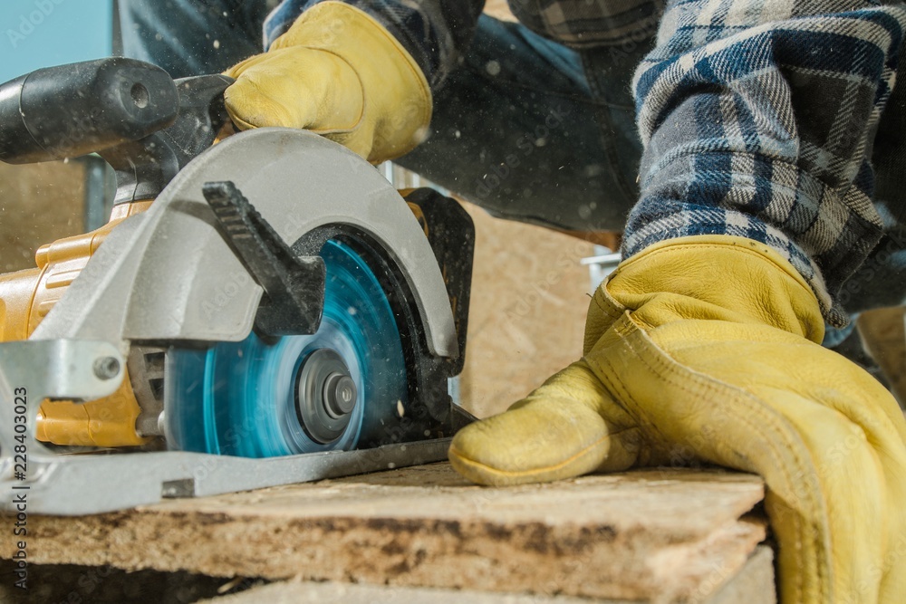 Fototapeta premium Circular Saw Woodwork Job