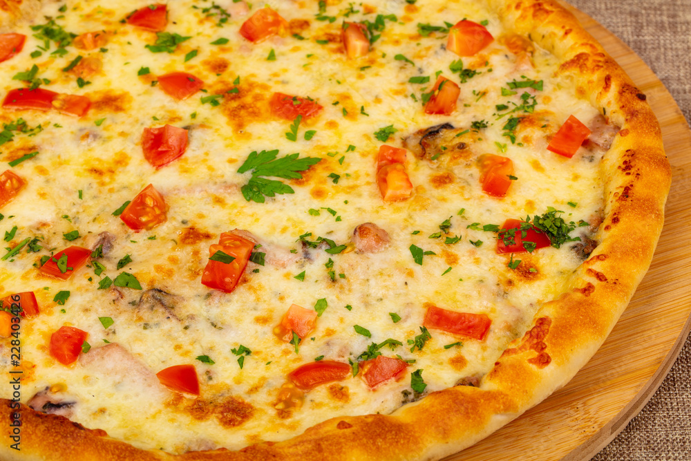 Seafood pizza with tomatoes
