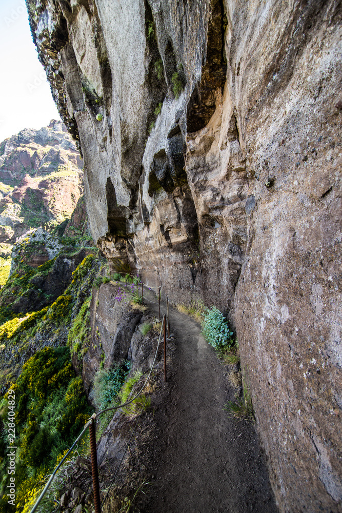 Hike between Pico do Areeiro and Pico Ruivo, Madeira, Portugal. Beautiful mountains landscape. Hike between Pico do Areeiro and Pico Ruivo, Madeira, Portugal. Beautiful mountains landscape.