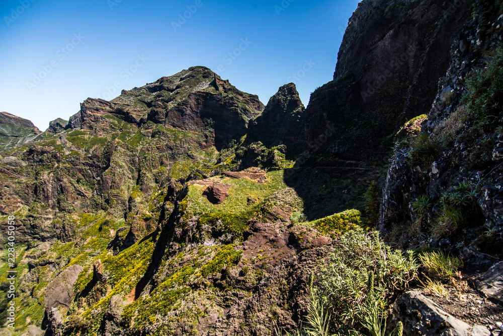 Hike between Pico do Areeiro and Pico Ruivo, Madeira, Portugal. Beautiful mountains landscape. Hike between Pico do Areeiro and Pico Ruivo, Madeira, Portugal. Beautiful mountains landscape.