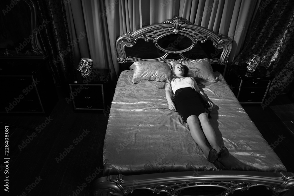 Strangled beautiful business woman in a bedroom Stock Photo | Adobe Stock