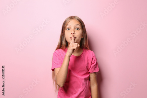 Little girl in t-shirt show...