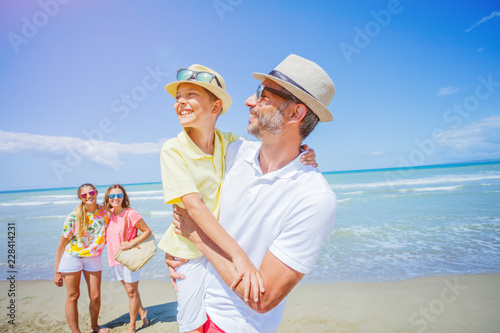 Happy family having fun in the summer leisure