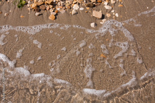 Rocks and Stone beach pattern closeup, Summer seacoast background