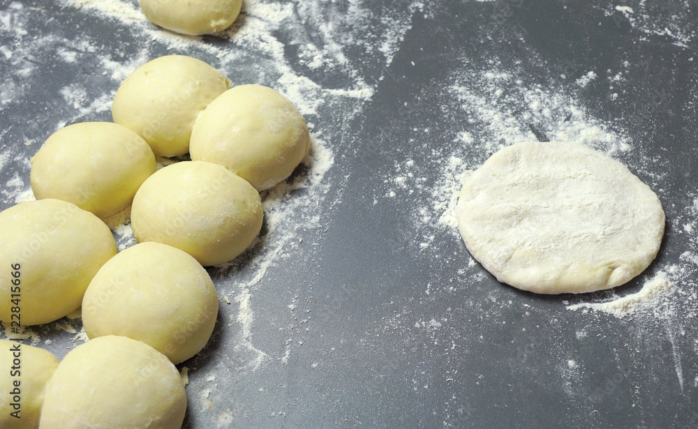 Dough balls and flour Dough balls and flour