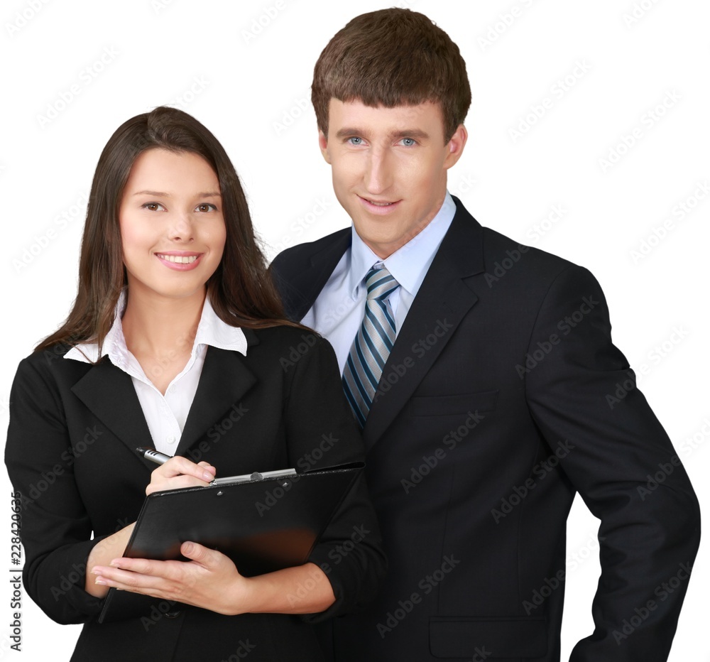 Businessman Standing and Businesswoman Sign Document - Isolated Businessman Standing and Businesswoman Sign Document - Isolated
