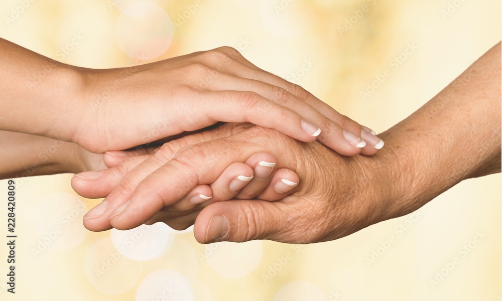 Fototapeta premium Hands of the old man and a