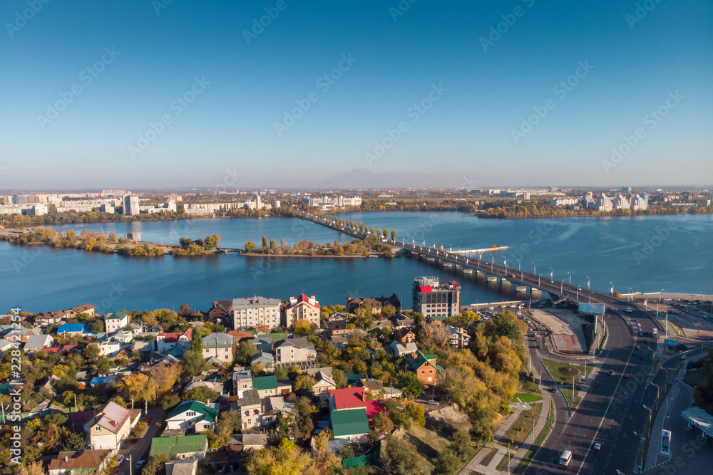 Aerial view of Voronezh downtown, view to Chernavsky bridge and big river, modern city in sunny day