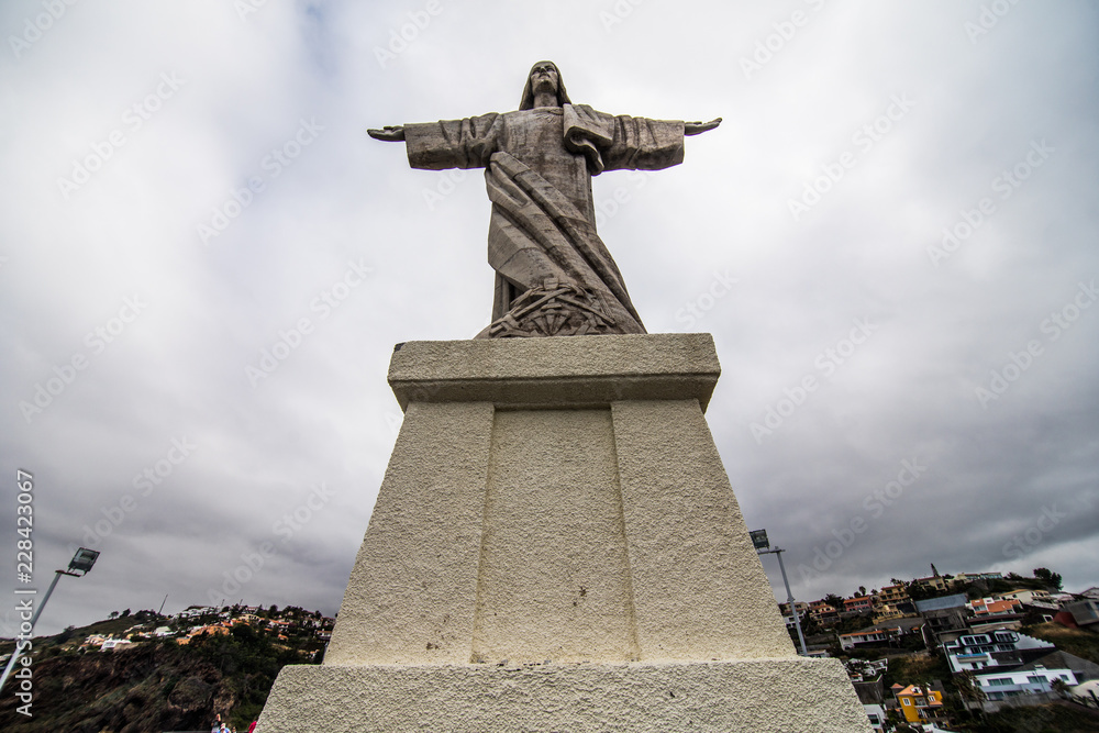 The Christ the King statue is a Catholic monument on Madeira island