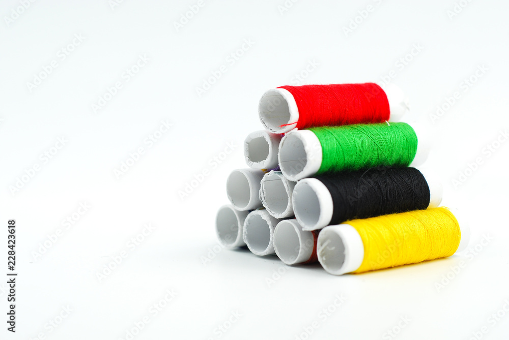 spools of thread isolated on white background spools of thread isolated on white background