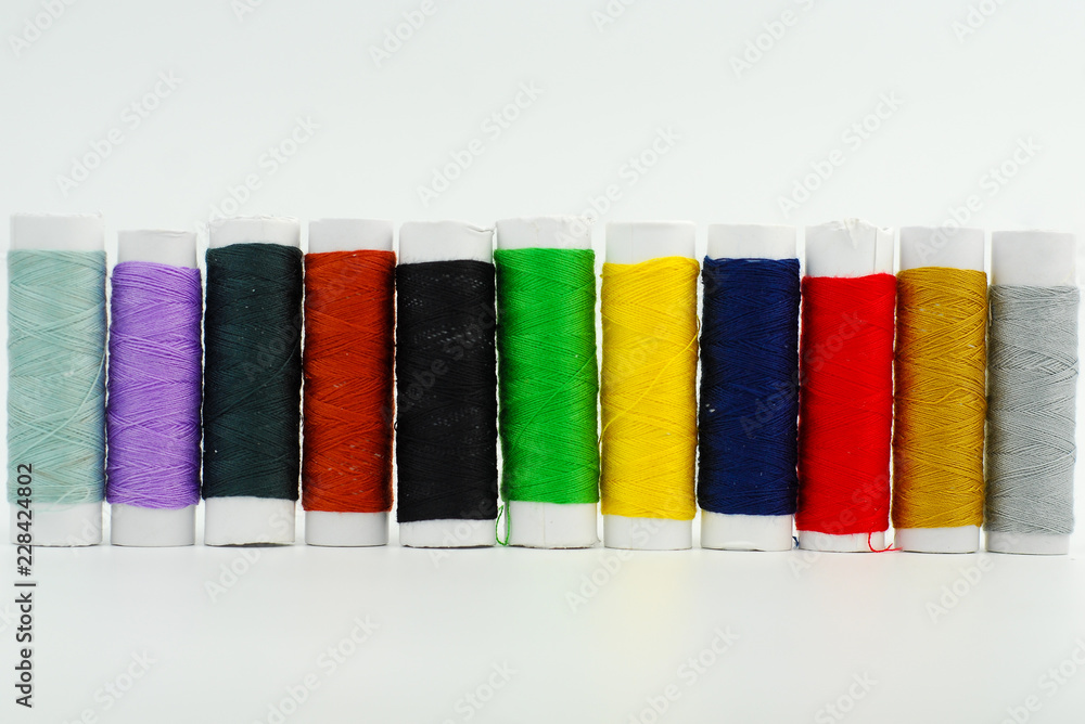 spools of thread isolated on white background spools of thread isolated on white background