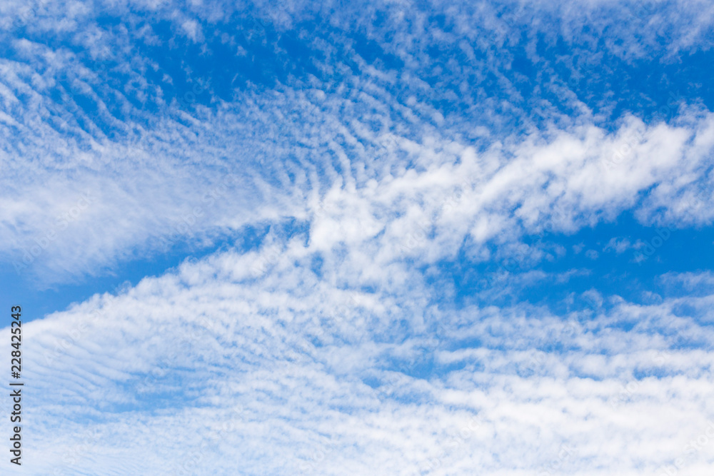 Blue sky with clouds background