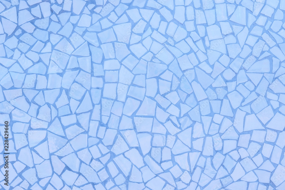 Broken tiles mosaic seamless pattern. Blue the tile wall high resolution real photo or brick seamless and texture interior background. Broken tiles mosaic seamless pattern. Blue the tile wall high resolution real photo or brick seamless and texture interior background.