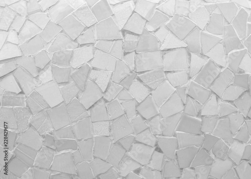 Fototapeta Naklejka Na Ścianę i Meble -  Broken tiles mosaic seamless pattern. White and Grey the tile wall high resolution real photo or brick seamless and texture interior background.