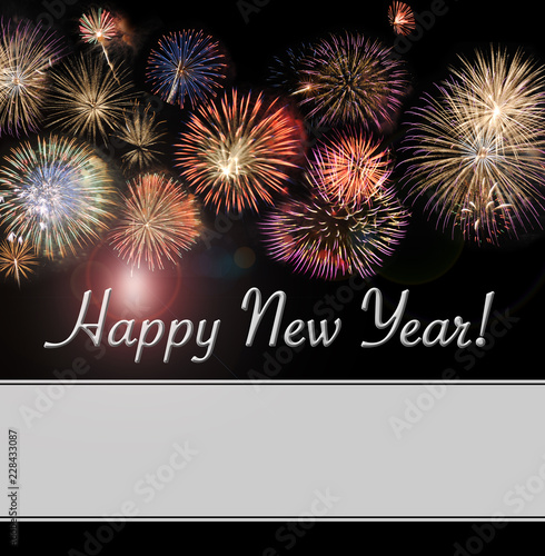 Happy New Year card and banner with beautiful flashy fireworks with plenty of area for additional white text for your message.