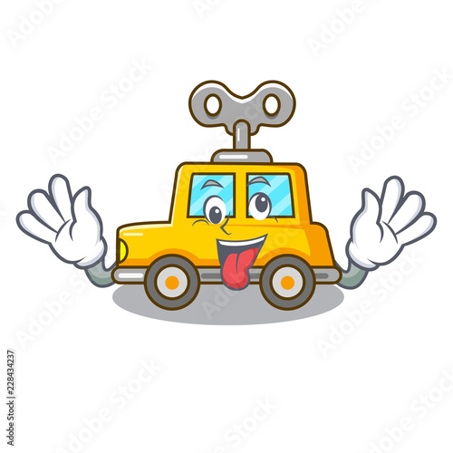 Crazy clockwork toy car isolated on mascot