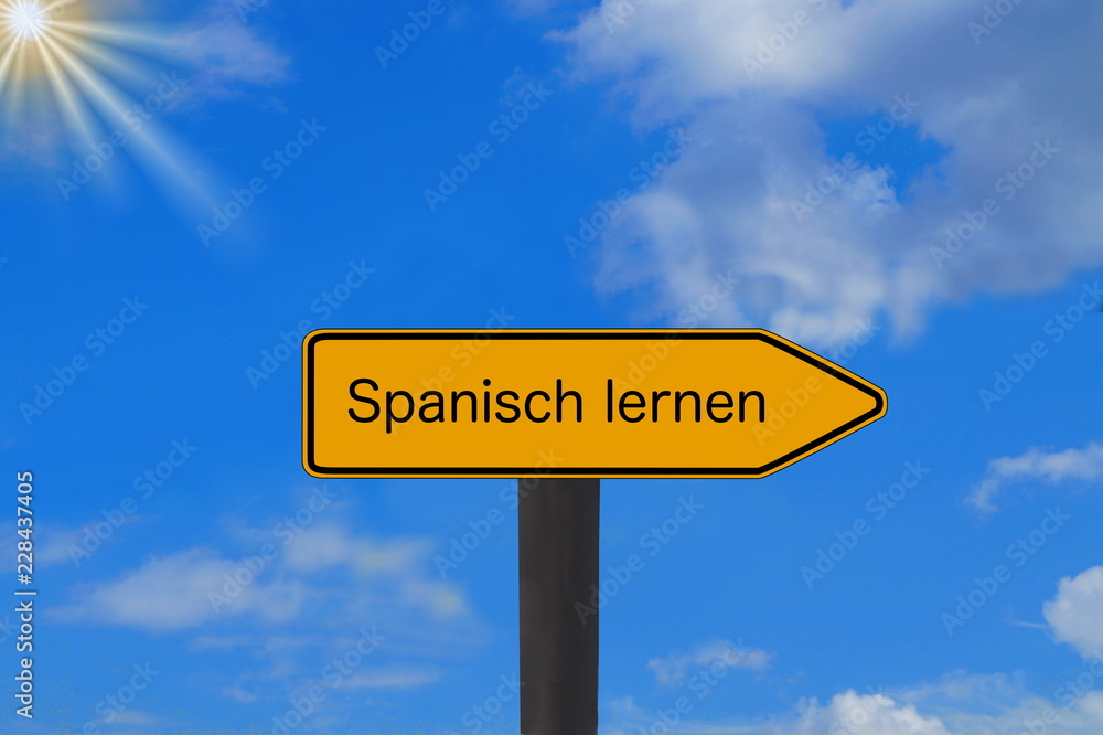 Ein Schild mit dem Aufdruck Spanisch Lernen Ein Schild mit dem Aufdruck Spanisch Lernen