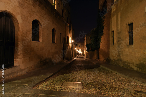 Medieval Avenue of the Knights at night  a cobblestone street in Rhodes Citadel   Greece