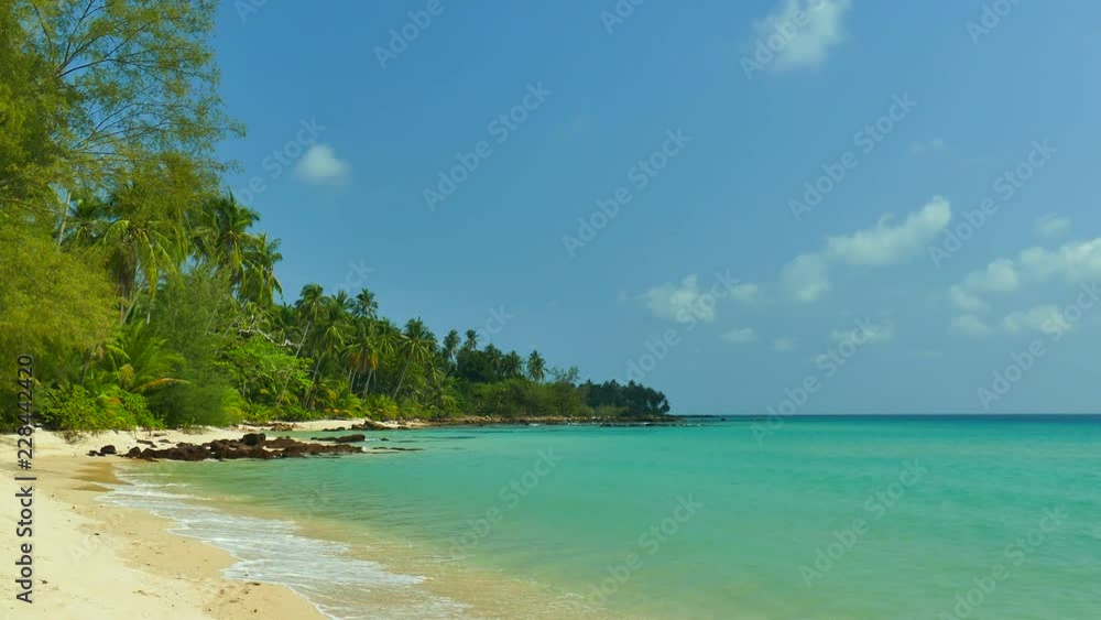 Nature with tropical sea and beach on white cloud and blue sky Nature with tropical sea and beach on white cloud and blue sky