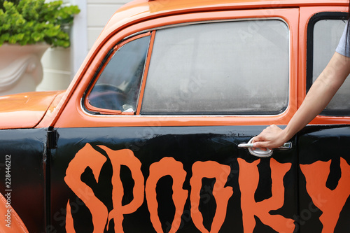 Hand with  car - Halloween Background