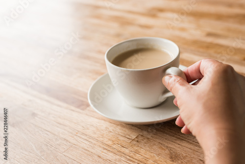 woman hold a cup a coffee